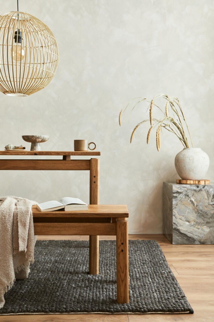 Elegant dining room interior composition with wooden dining table, bench